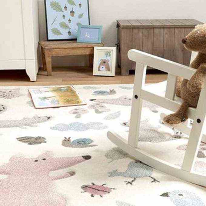 Ecru Rug And Furniture In Baby Room 