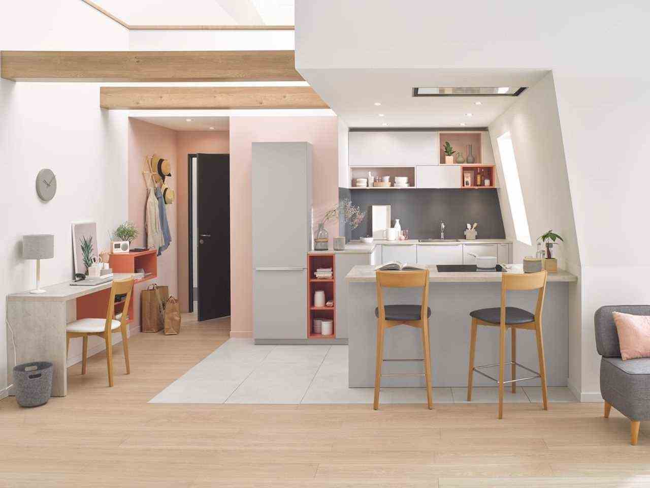 Small gray and white kitchen in a colorful interior