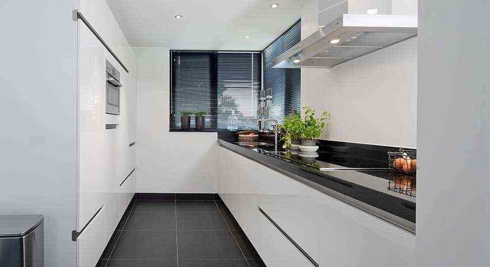 Black and white hallway kitchen 