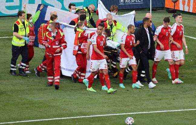 Danish players and rescuers accompany Christian Eriksen, victim of discomfort in the middle of a match on Saturday. 