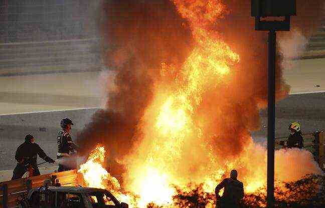 Romain Grosjean's car on fire. 