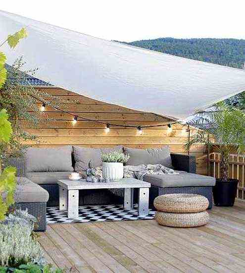 A Shade Sail, A Palisade, Vegetation, So Many Solutions To Protect You From Opposite 