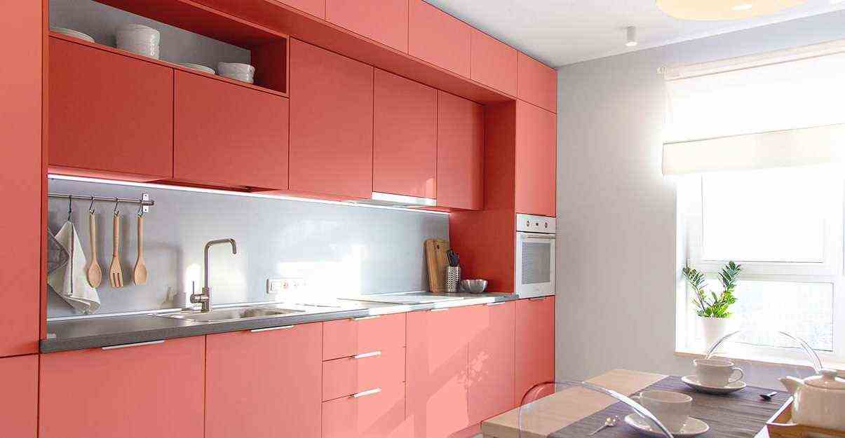 A Coral And White Kitchen 