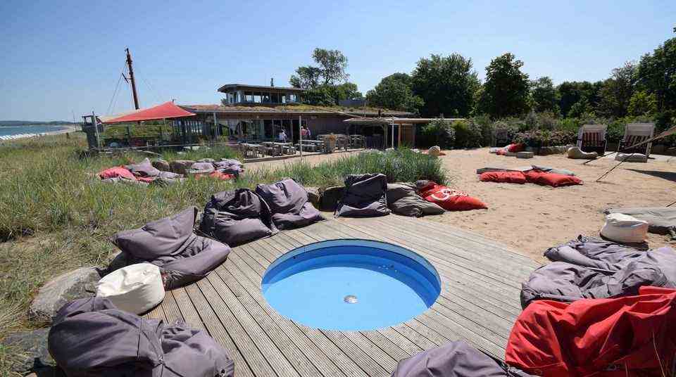Small pool, empty Fatboy bean bags and the beach bistro