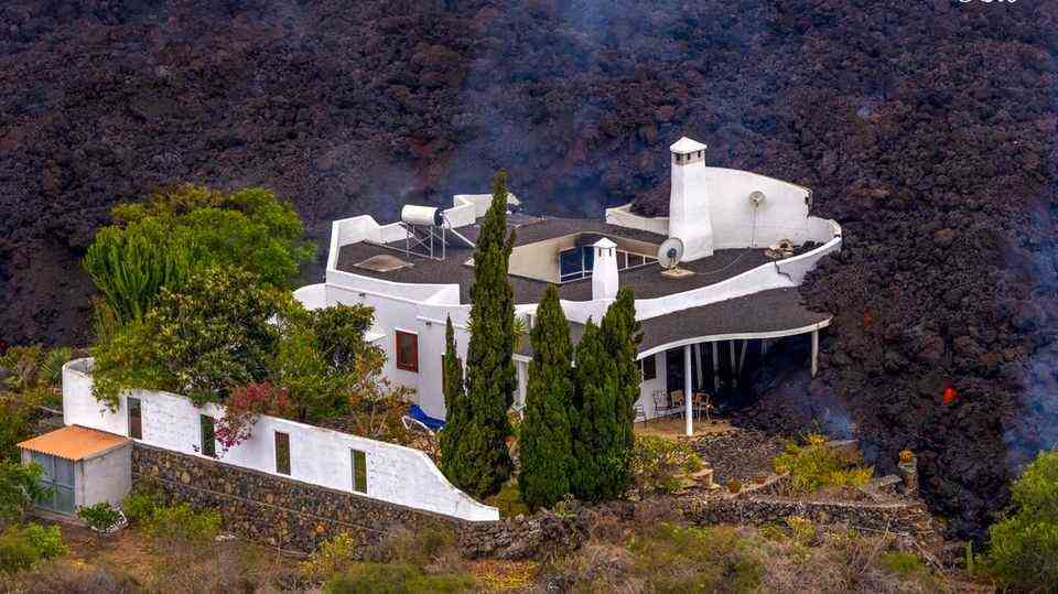 The owners of this property are less fortunate.  Your house is simply swallowed up by the meter-high mass of lava
