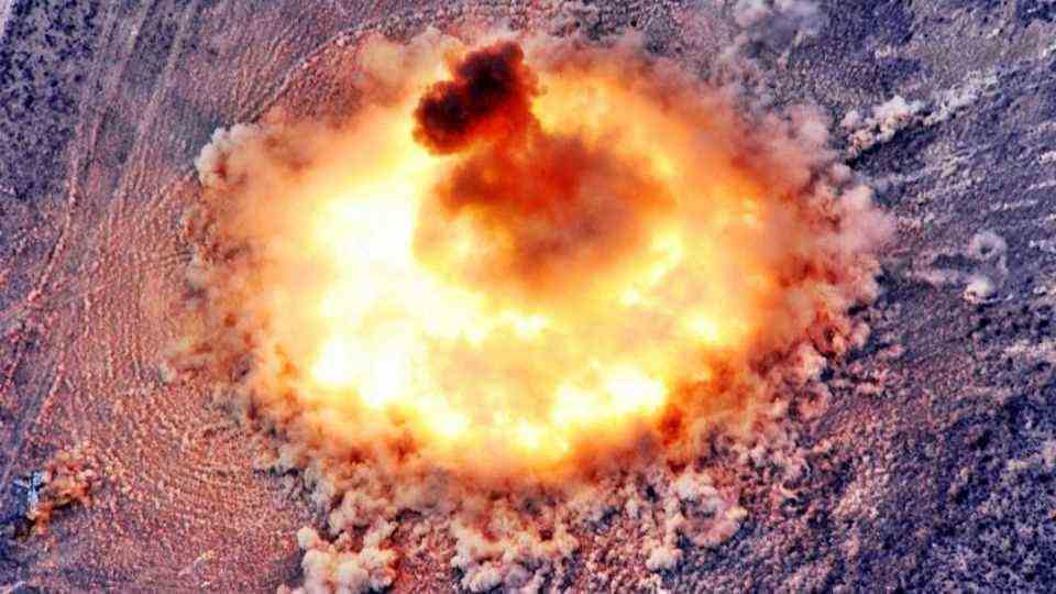 The photo shows the explosion and the beginning blast wave of the father of all bombs.