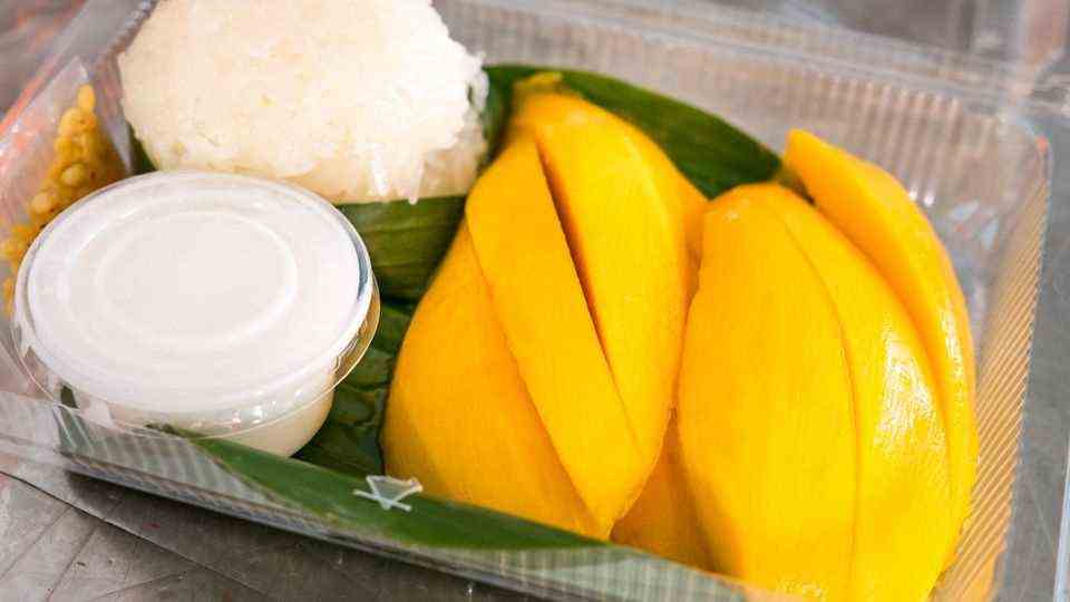 Mango and Sticky Rice, Thailand Mango with sticky rice drizzled with coconut milk.  Delicious to put in!  You can find it on almost every street corner in Bangkok.