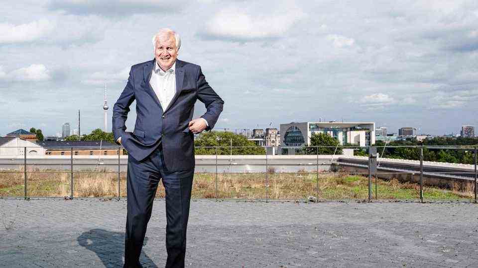 TV tower, Reichstag and even Angela Merkel's Chancellery: Germany's interior minister has everything in view from the roof terrace