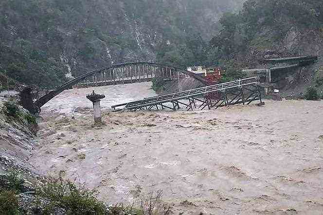 A bridge under construction collapsed in Chalthi, northern India, on October 19.
