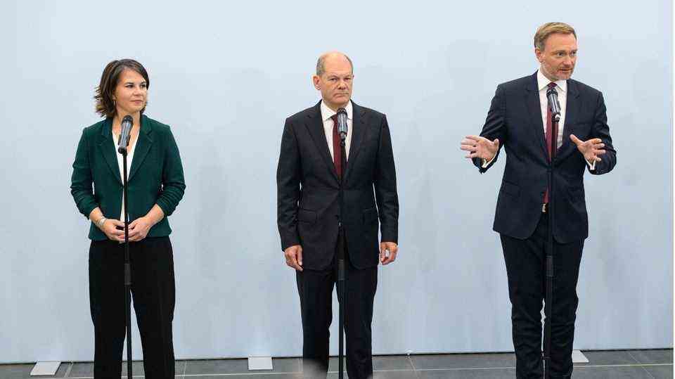 From left: Greens co-chair Annalena Baerbock, SPD chancellor candidate Olaf Scholz and FDP leader Christian Lindner