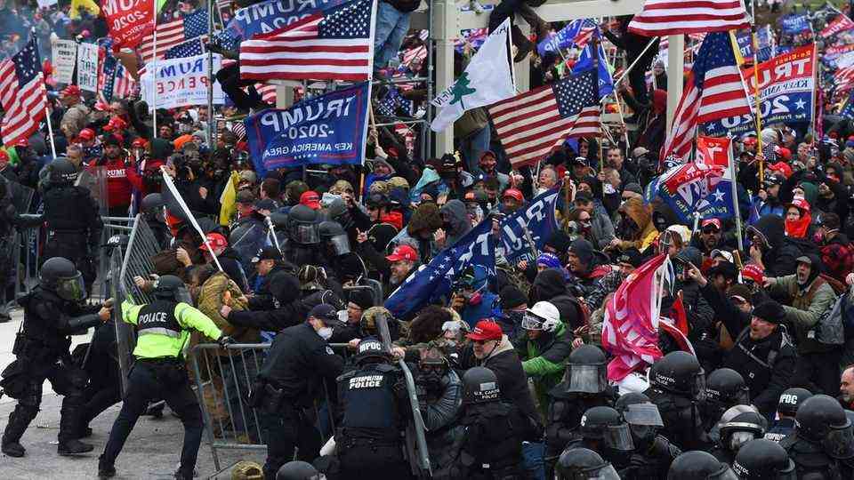 Trump supporters clash with police and security forces as they storm the barricades to take the U.S. Capitol