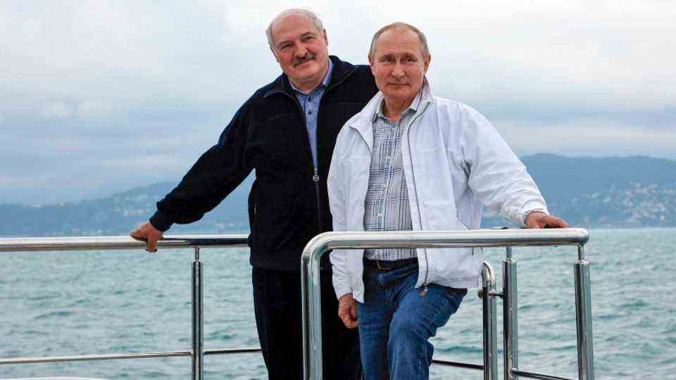 Vladimir Putin and Alexander Lukashenko on a boat