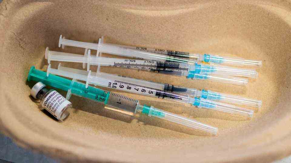 Booster vaccination: mounted syringes with a vaccine against the coronavirus