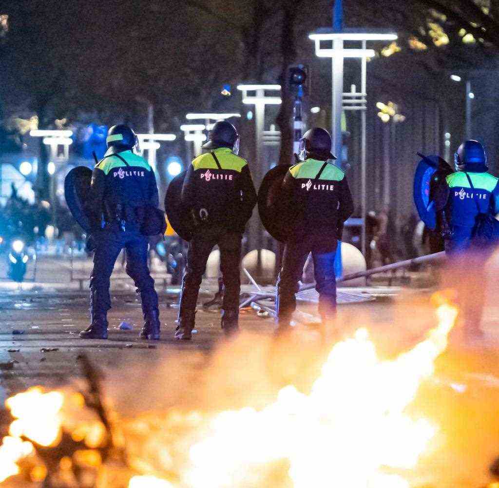 Police officers during the riot in Rotterdam