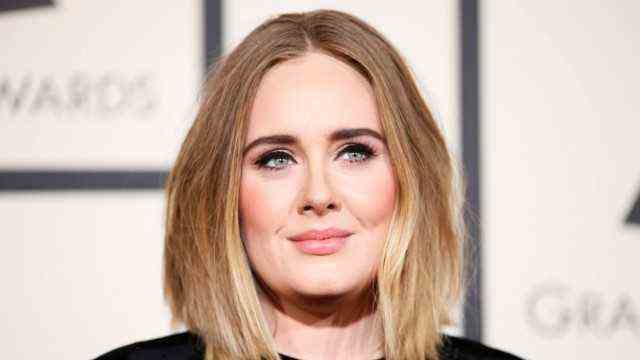 FILE PHOTO: Adele arrives at the 58th Grammy Awards in Los Angeles