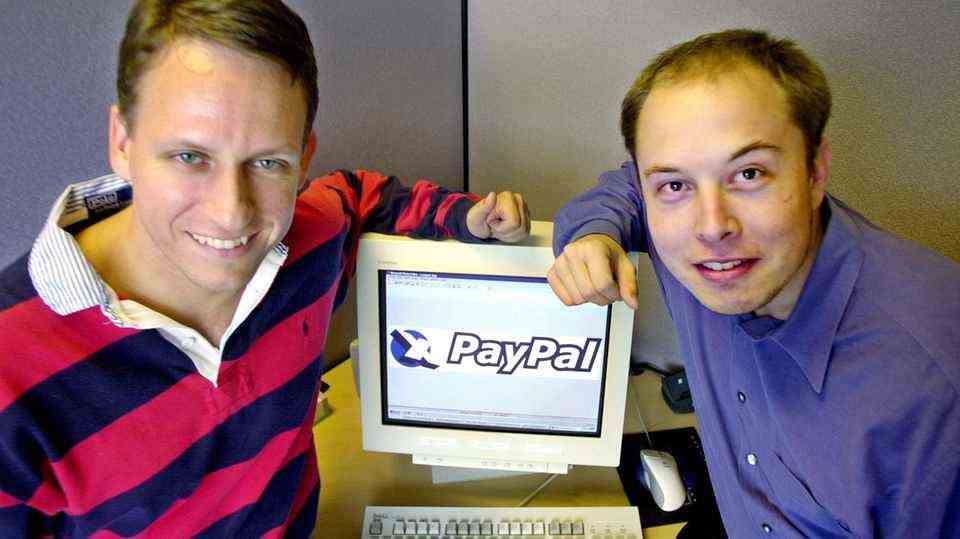 Tesla boss Elon Musk earlier at a presentation of his company PayPal.  His hair looked different back then.