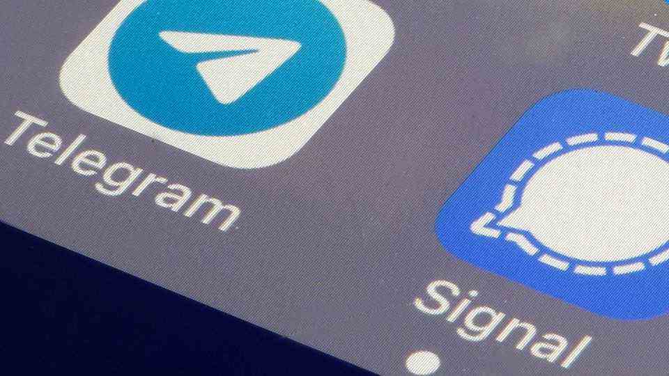 The Telegram and Signal apps on a smartphone