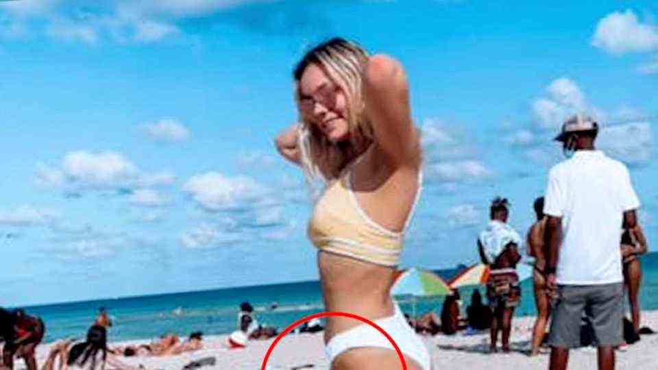 Tiktokerin shoots bikini photo on the beach - and only later realizes what it looks like
