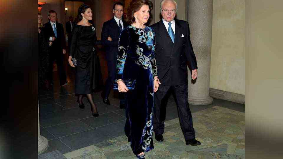 Queen Silvia and King Carl Gustaf (right) as well as Crown Princess Victoria (left) and Prince Daniel at the award ceremony of the Nobelpr