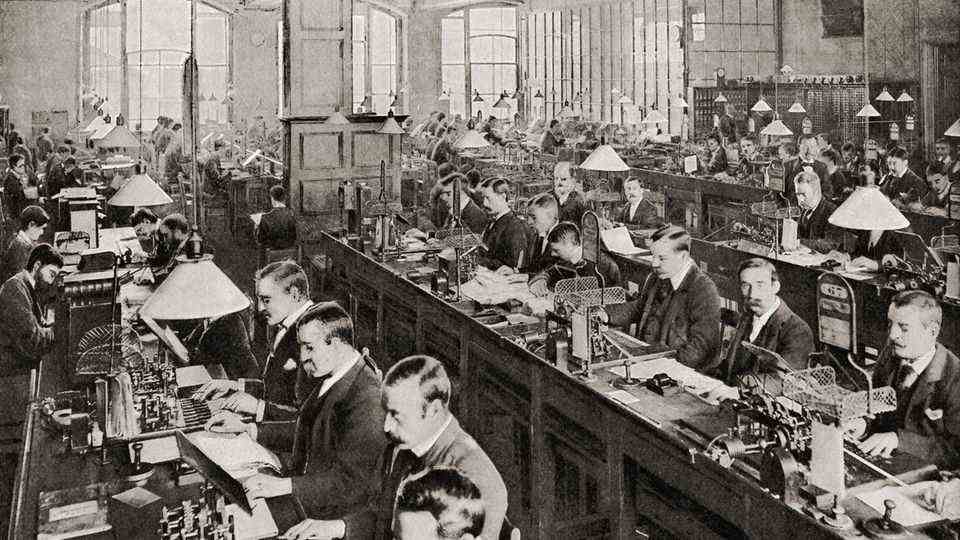 Men in the telegraph office in London at the end of the 19th century