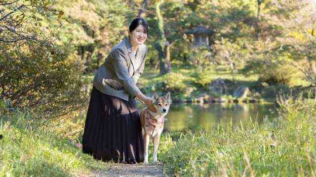 Japan: Aiko, here with her dog Yuri, has so far been an exemplary princess and is popular with the people.