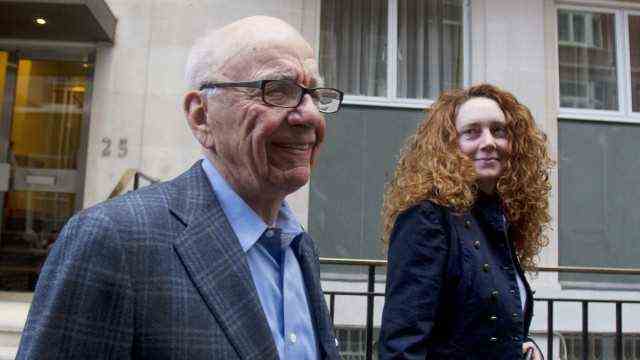 File photo of News Corporation CEO Rupert Murdoch leaving his flat with Rebekah Brooks, then Chief Executive of News International, in central London