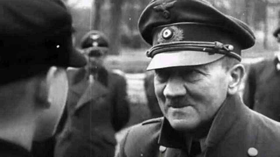 The German newsreel showed how Hitler distinguished the boys.  It did not show how much the dictator suffered from paralysis.  These scenes have been cut out.