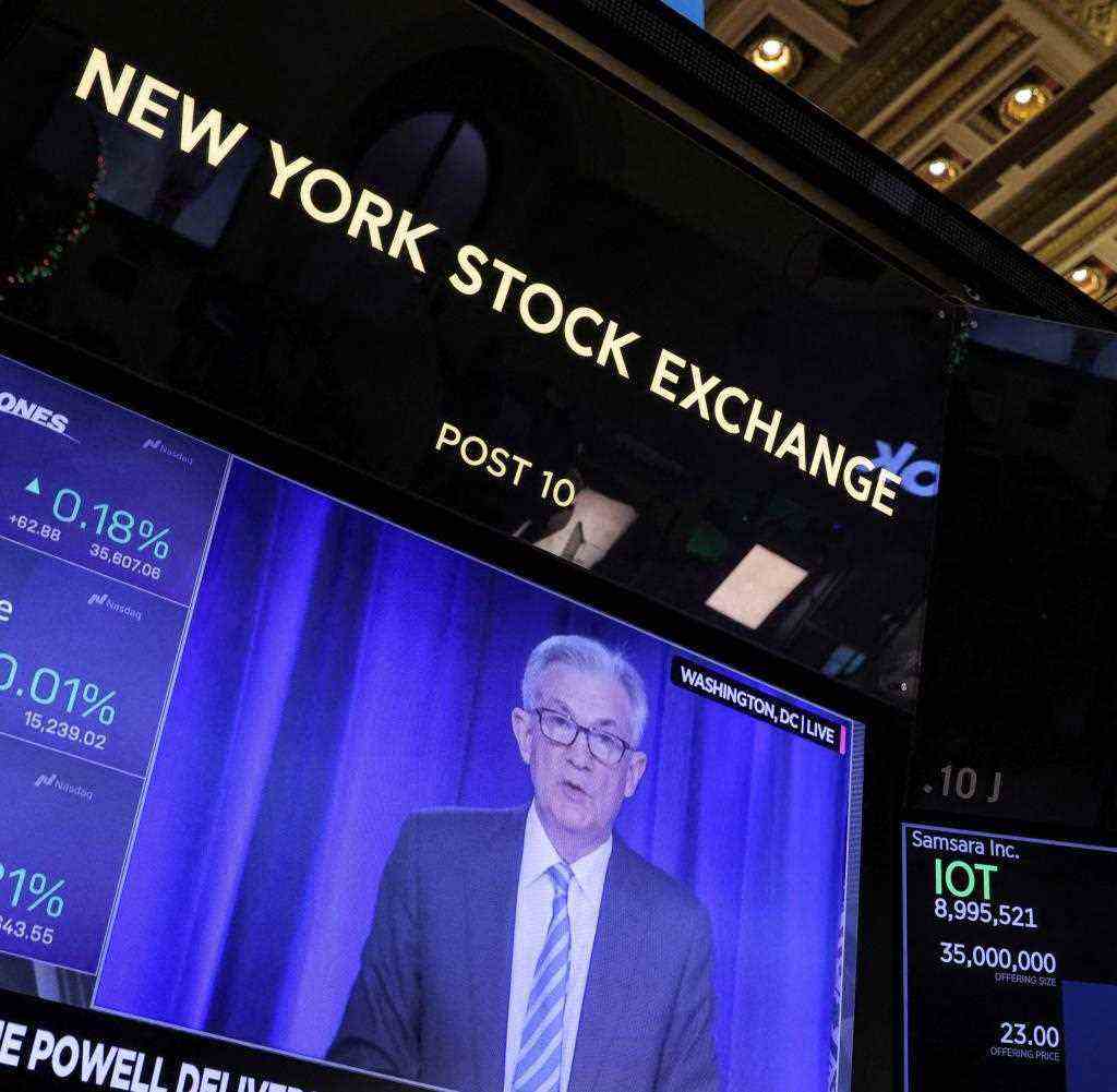 Jerome Powell speaking on television on New York's Wall Street in Manhattan