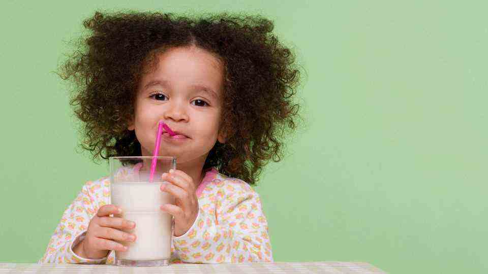 child drinks milk