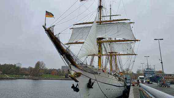 The Gorch Fock from the side front view is moored in the harbour.  Photo: Christian Wolf