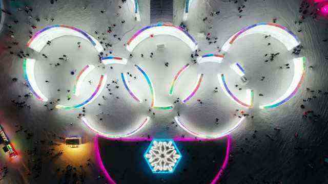 China: Olympics play a big role in "International Ice and Snow Festival" in Manchuria.