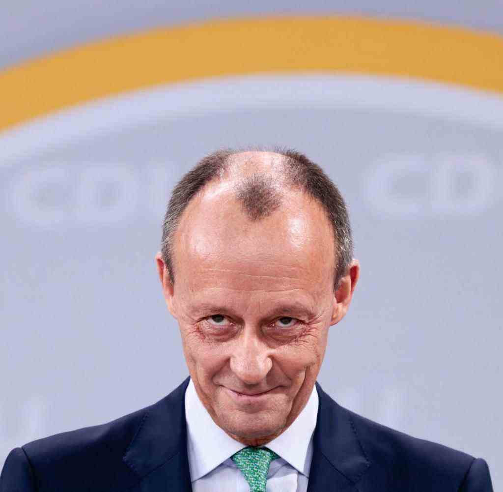 Christian Democratic Party (CDU) designated Chairman Friedrich Merz looks on during a party congress of the Christian Democratic Party (CDU) at the party's headquarters in Berlin, Germany, on January 21, 2022. (Photo by HANNIBAL HANSCHKE / POOL / AFP)