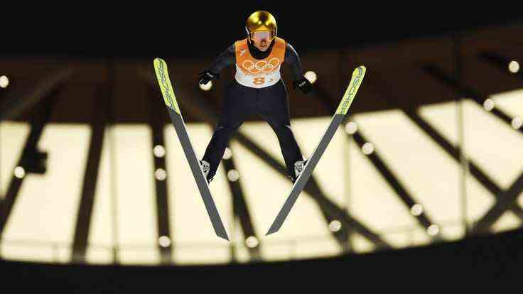 Katharina Althaus during her attempt at the ski jumping team competition at the Olympics.