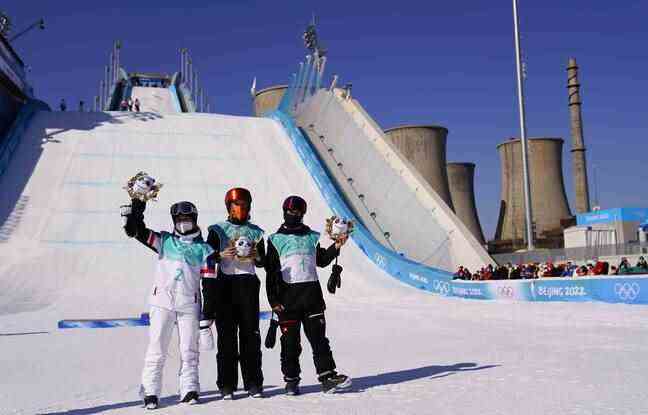 The finalists of the Big Air final, including the Frenchwoman Tess Ledeux, pose on the artificial runway, installed on the site of a former steel factory in Beijing.