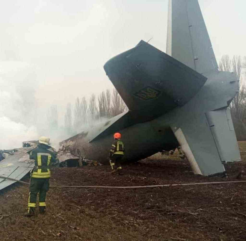 Rescue workers at the site of the crash of Ukraine's Antonov plane