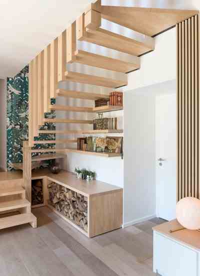 Storing Wood Under The Open Staircase 