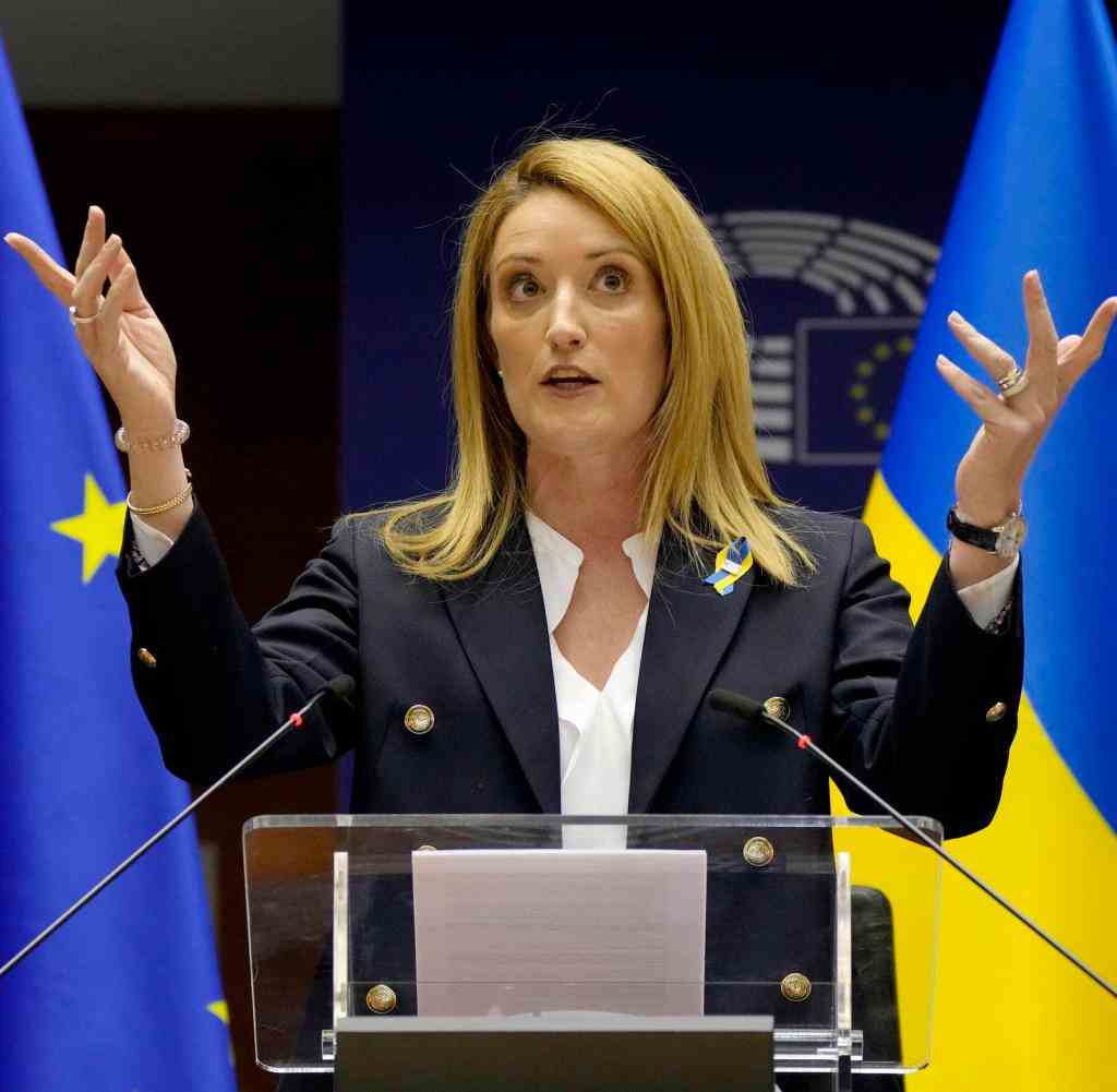 European Parliament President Roberta Metsola addresses an extraordinary session on Ukraine at the European Parliament in Brussels, Tuesday, March 1, 2022. The European Union's legislature meets in an extraordinary session to assess the war in Ukraine and condemn the invasion of Russia. EU Commission President Ursula von der Leyen and Council President Charles Michel will be among the speakers. (AP Photo/Virginia Mayo)