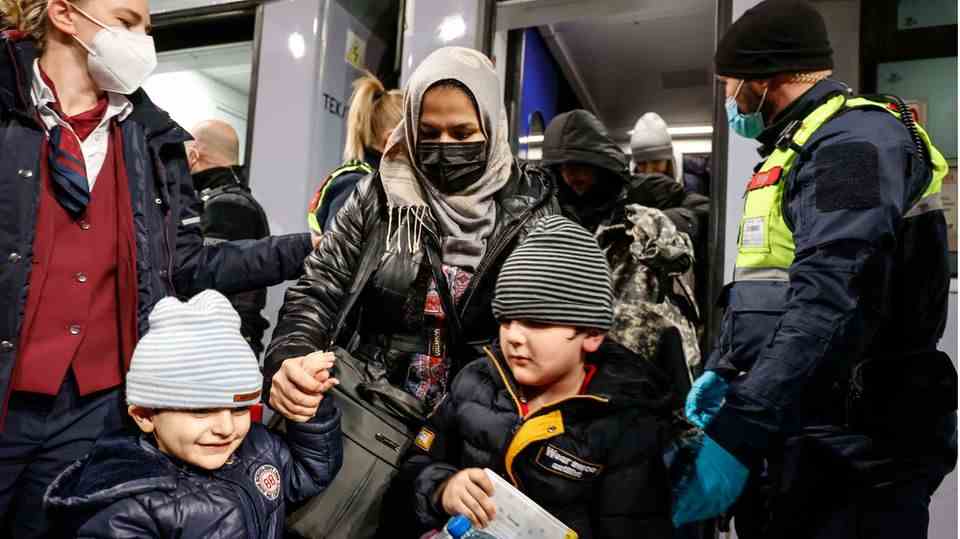 Ukrainian refugees arriving at Berlin Central Station.