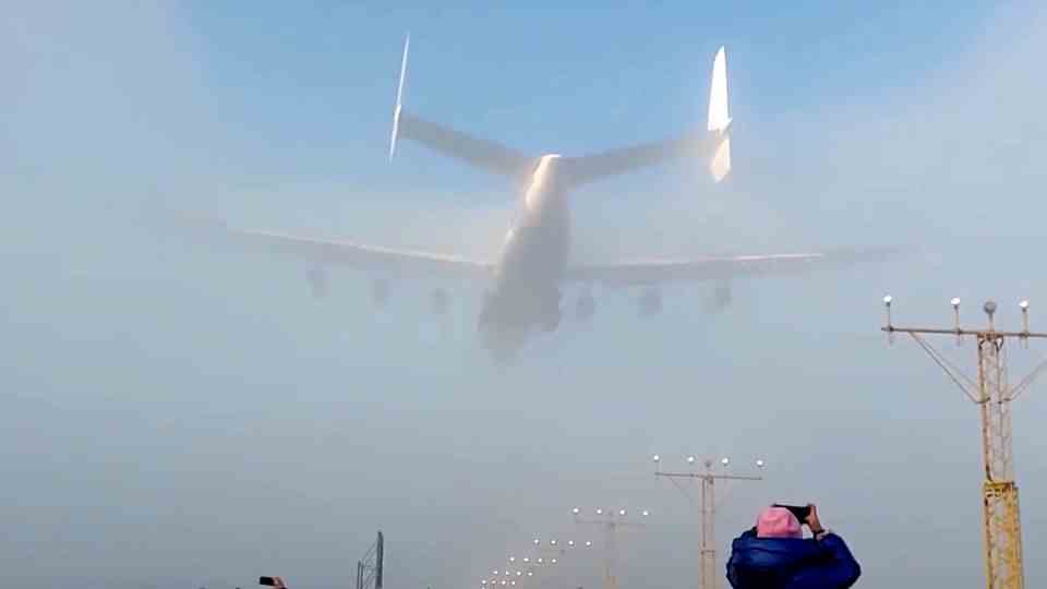 Antonov An-225: World's largest aircraft cuts through smoke screen