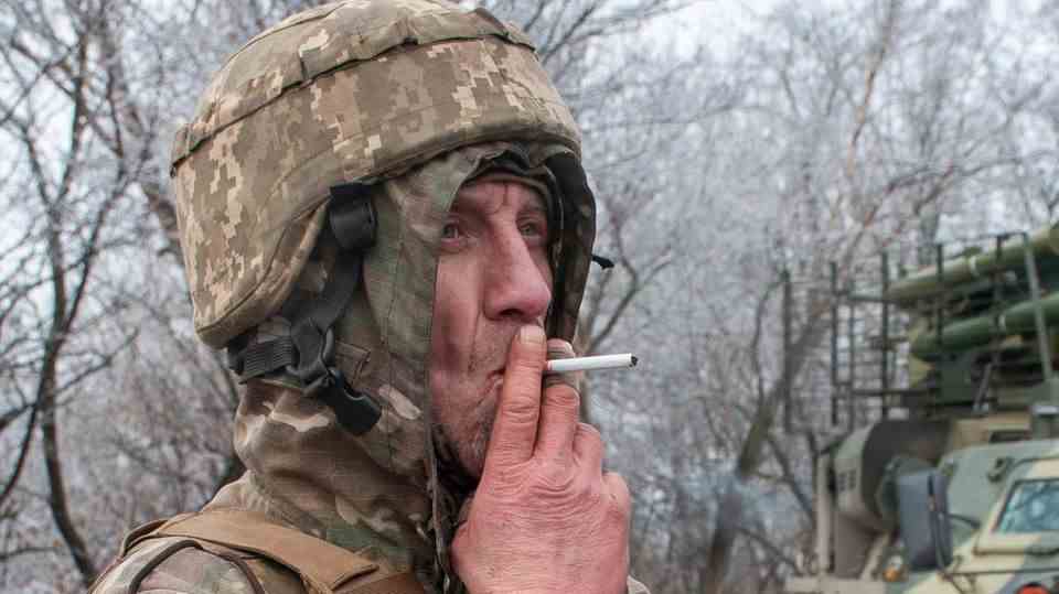 Ukraine-Russia War: A Ukrainian soldier smokes a cigarette