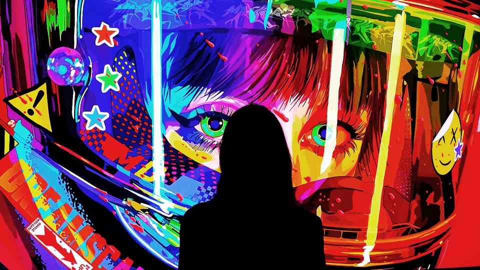 NFT: woman stands in front of digital artwork