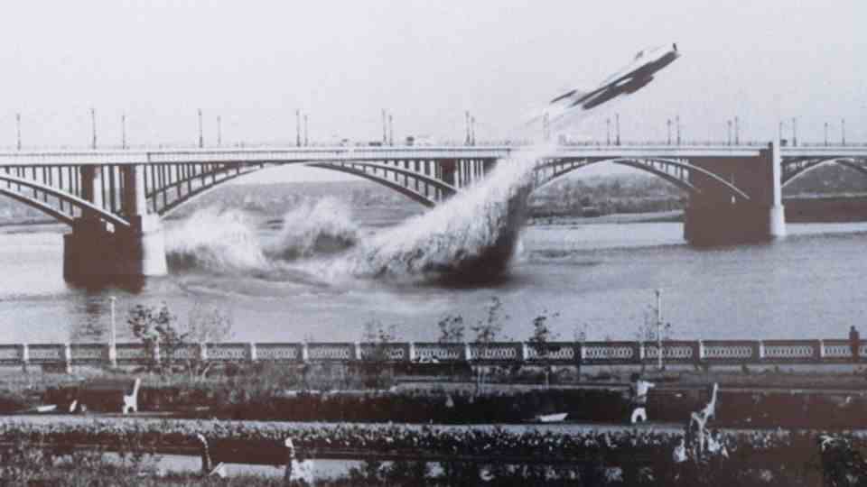 This picture is just as famous: A Mig dives under a bridge in Siberia.  But unfortunately it is a montage.