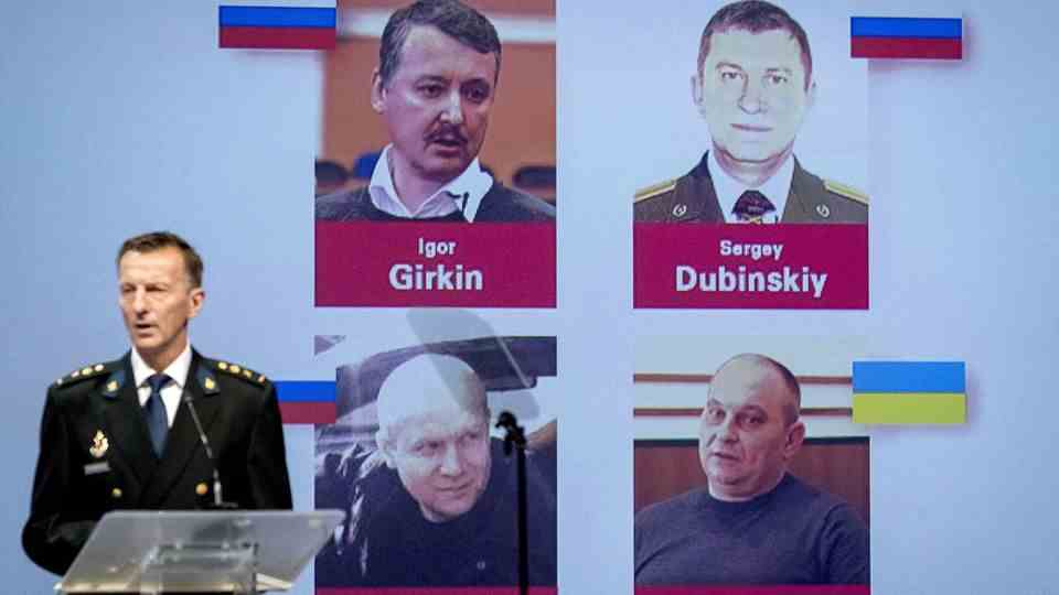 Investigators present photos of the four men believed to be responsible for the downing of the MH17 plane