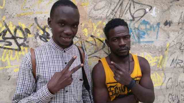 Senegal: Amakan (right), the beatboxer, and Magnoum, who works as a cameraman.
