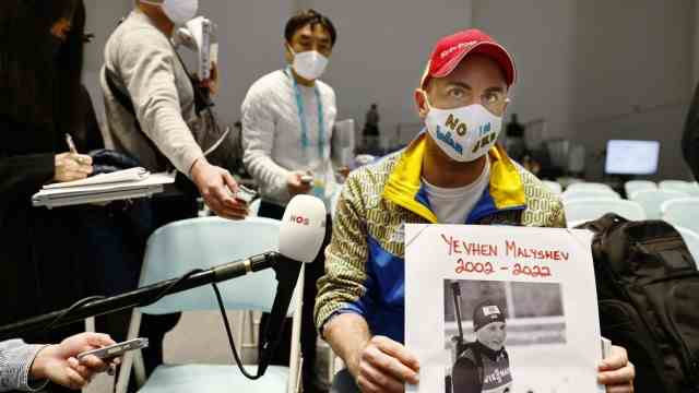 Paralympics: Questions for the questioner: Journalist Lee Reaney protests at the IPC press conference.