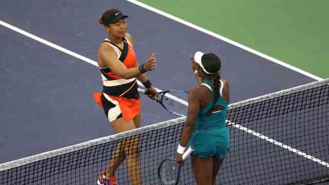 Tennis player Naomi Osaka: Shaking hands after the win: Naomi Osaka (left) and Sloane Stevens in Indian Wells.