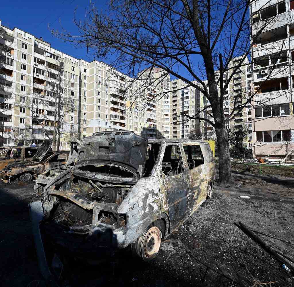 Destroyed vehicles in a Kyiv suburb on Monday afternoon