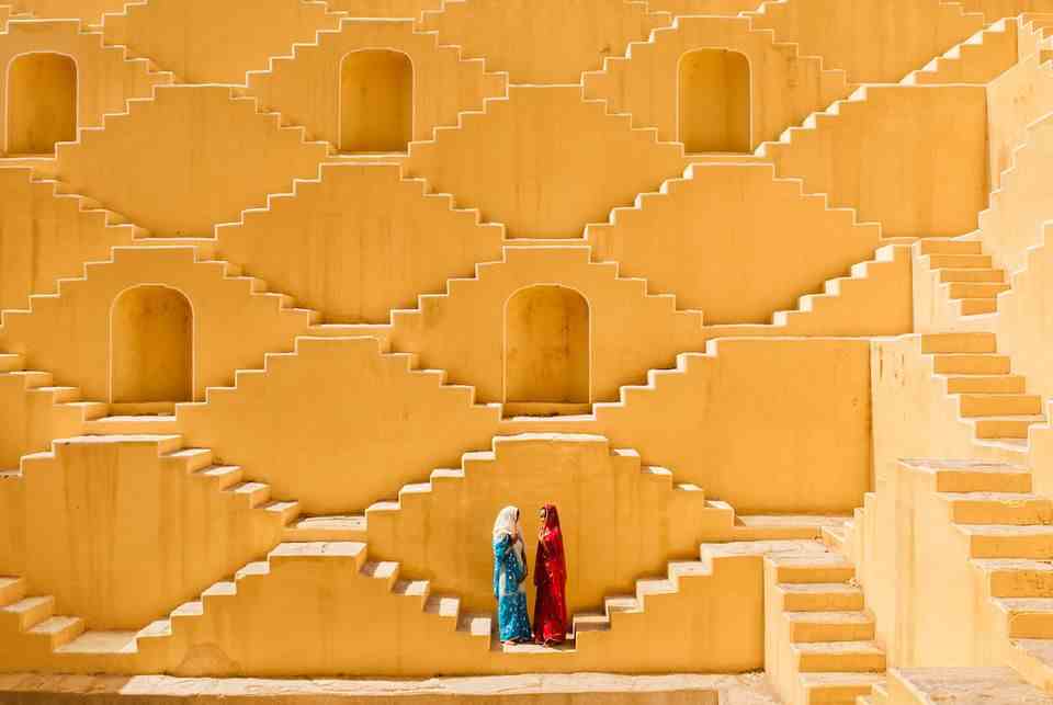 Manisha and Jasmin Singh stop at the Baoli, an ancient stepwell in a village near the city of Jaipur outside India's Thar Desert.  Ami Vitale, photographer and filmmaker of the "National Geographic"magazine, has traveled to more than 100 countries, witnessing not only violence and conflict, but also surreal beauty and the enduring power of the human spirit.
