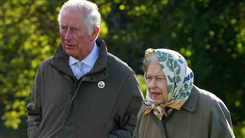 Prince Charles stands in for his mother.