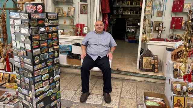 Easter: Ghassan Attieh runs a shop on the Way of the Cross in Jerusalem.  On the way to the Church of the Holy Sepulchre, you can stock up on candles and oil - and crowns of thorns.